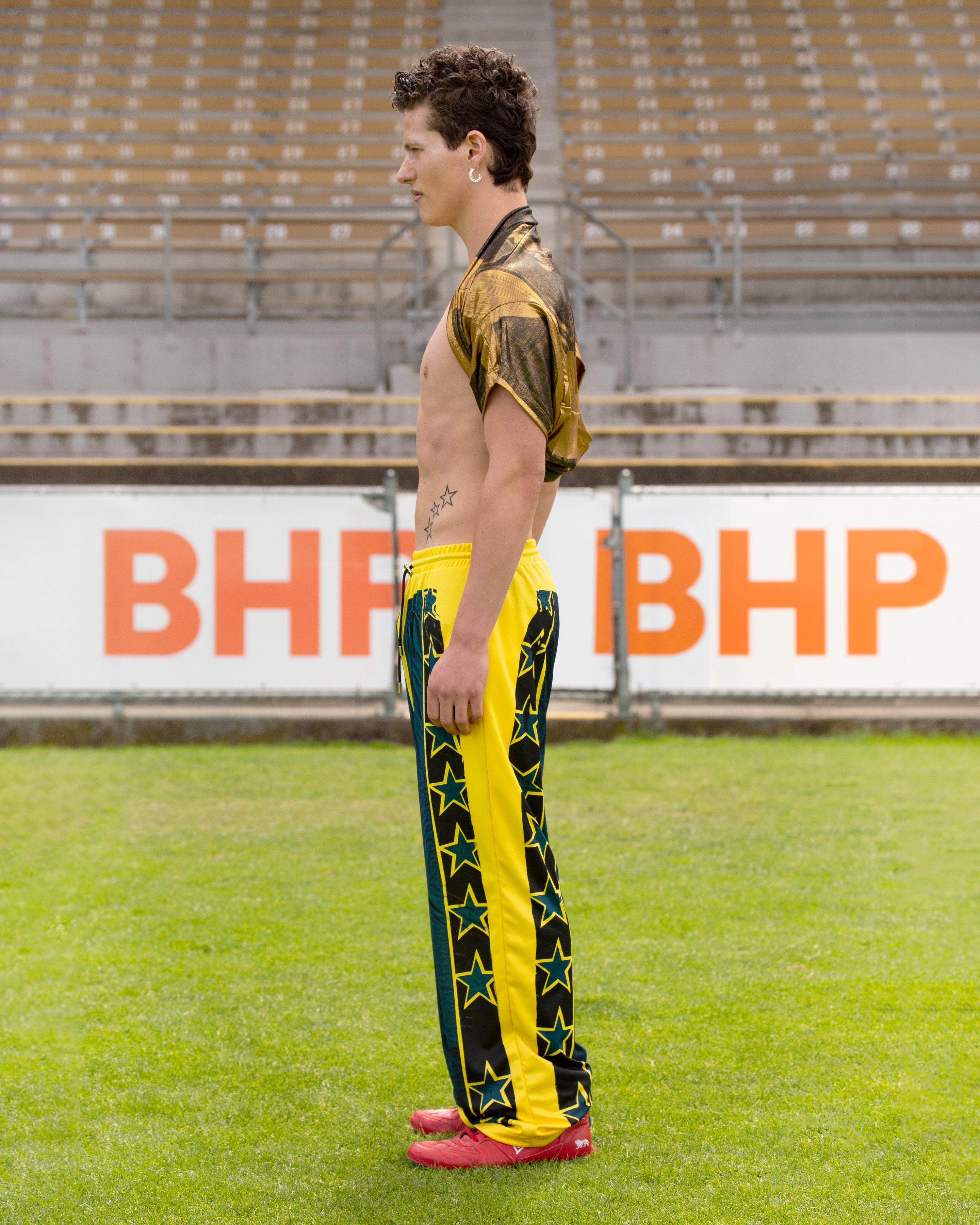 The Star Tracksuit Pants in Yellow