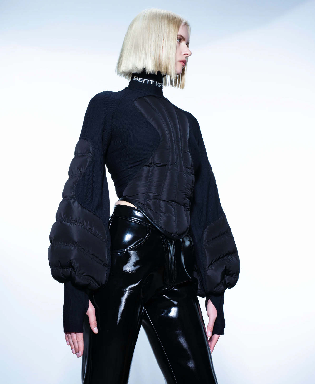 Schwarzer, gesteppter Mesh-Body