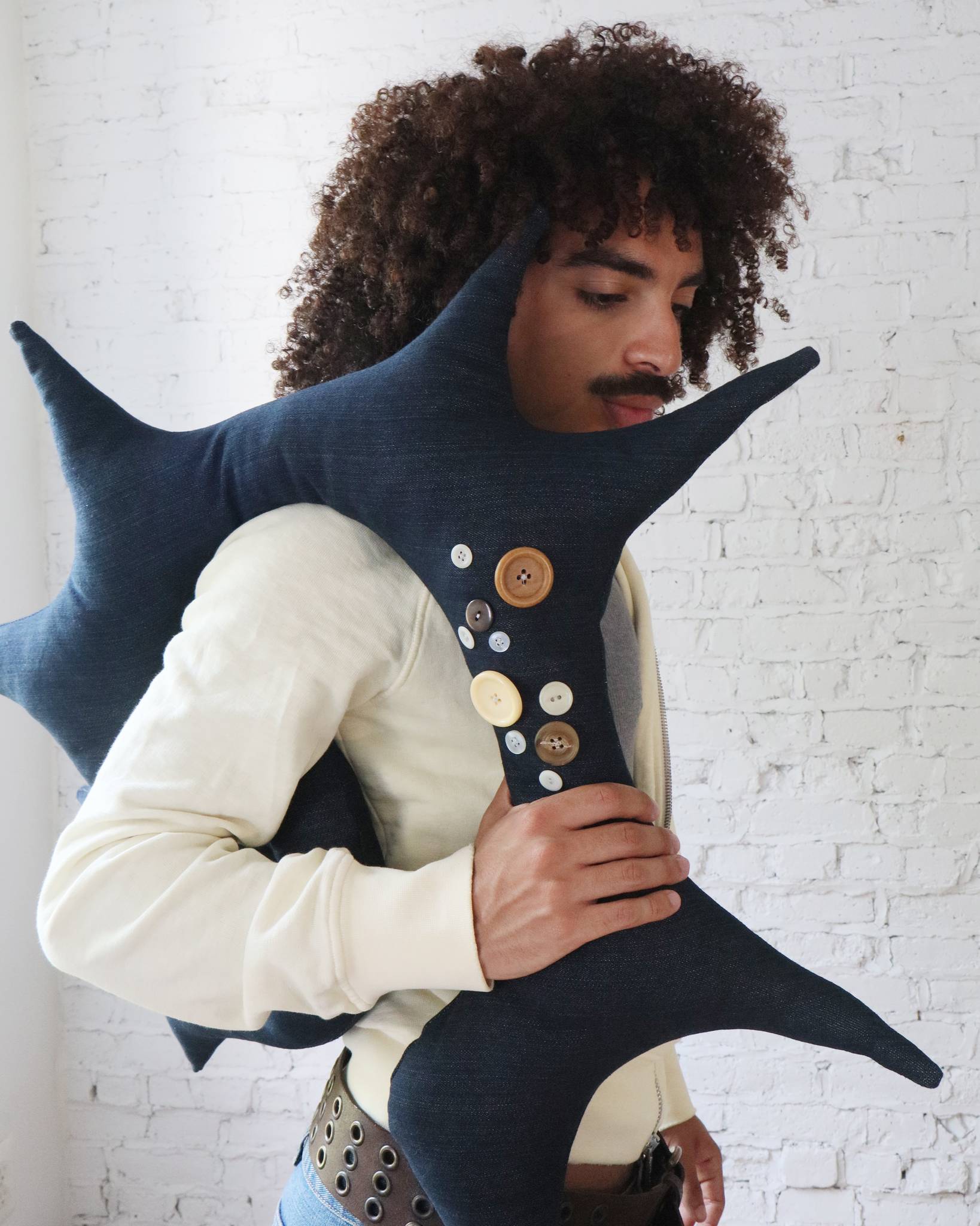Spiral Pillow in Buttoned Denim