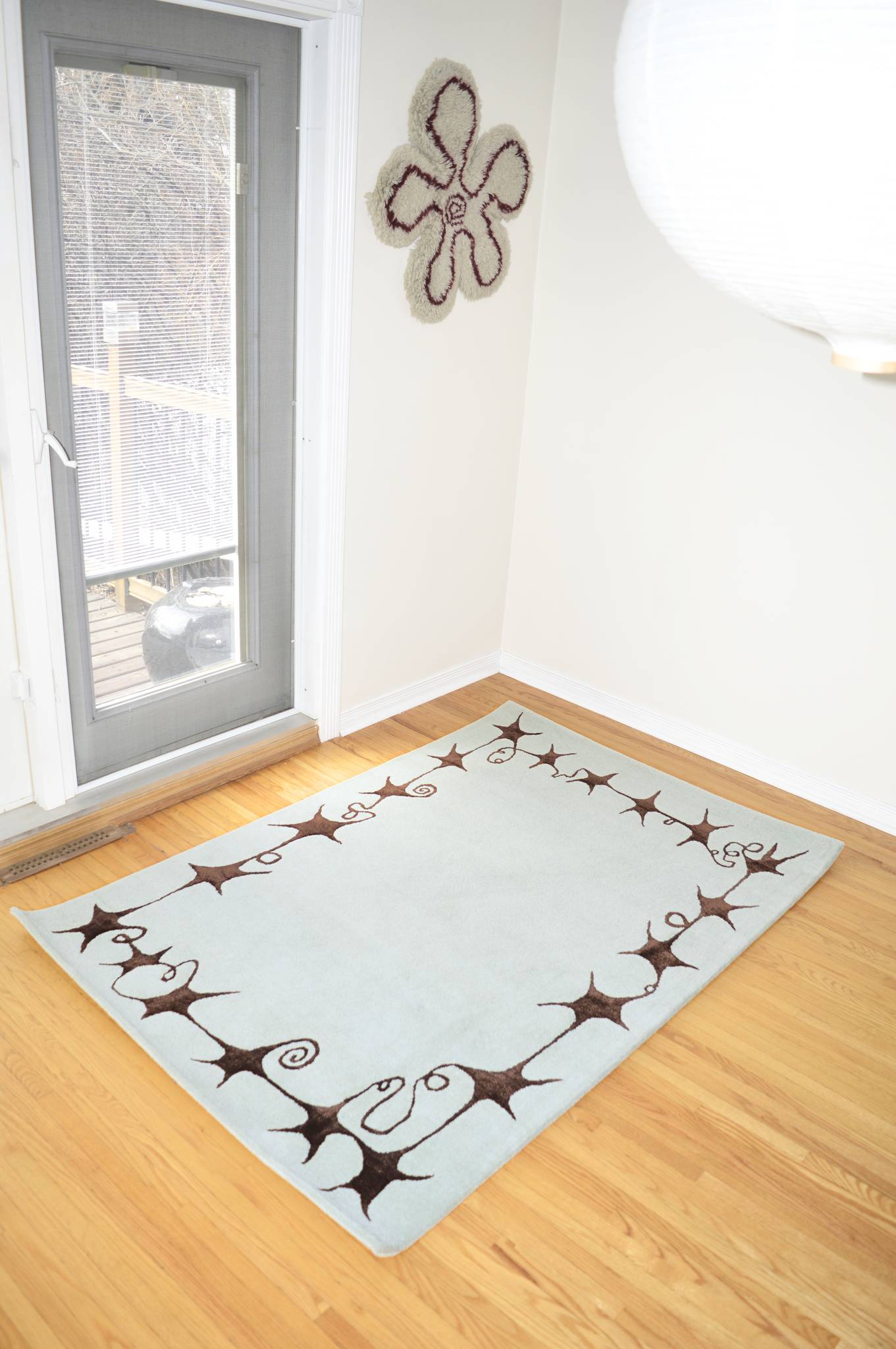The Swirly Star Rug in Baby Blue