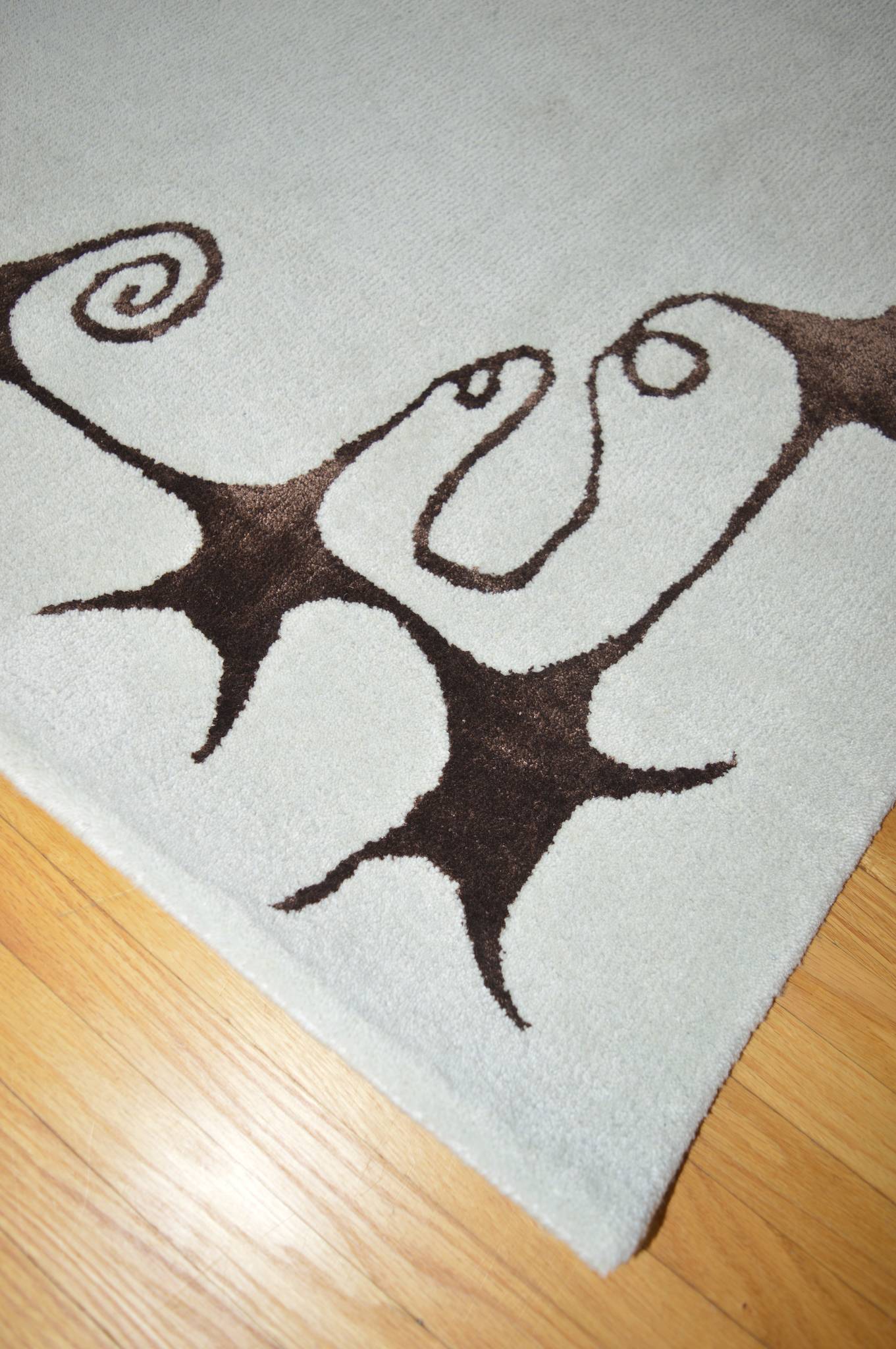 The Swirly Star Rug in Baby Blue