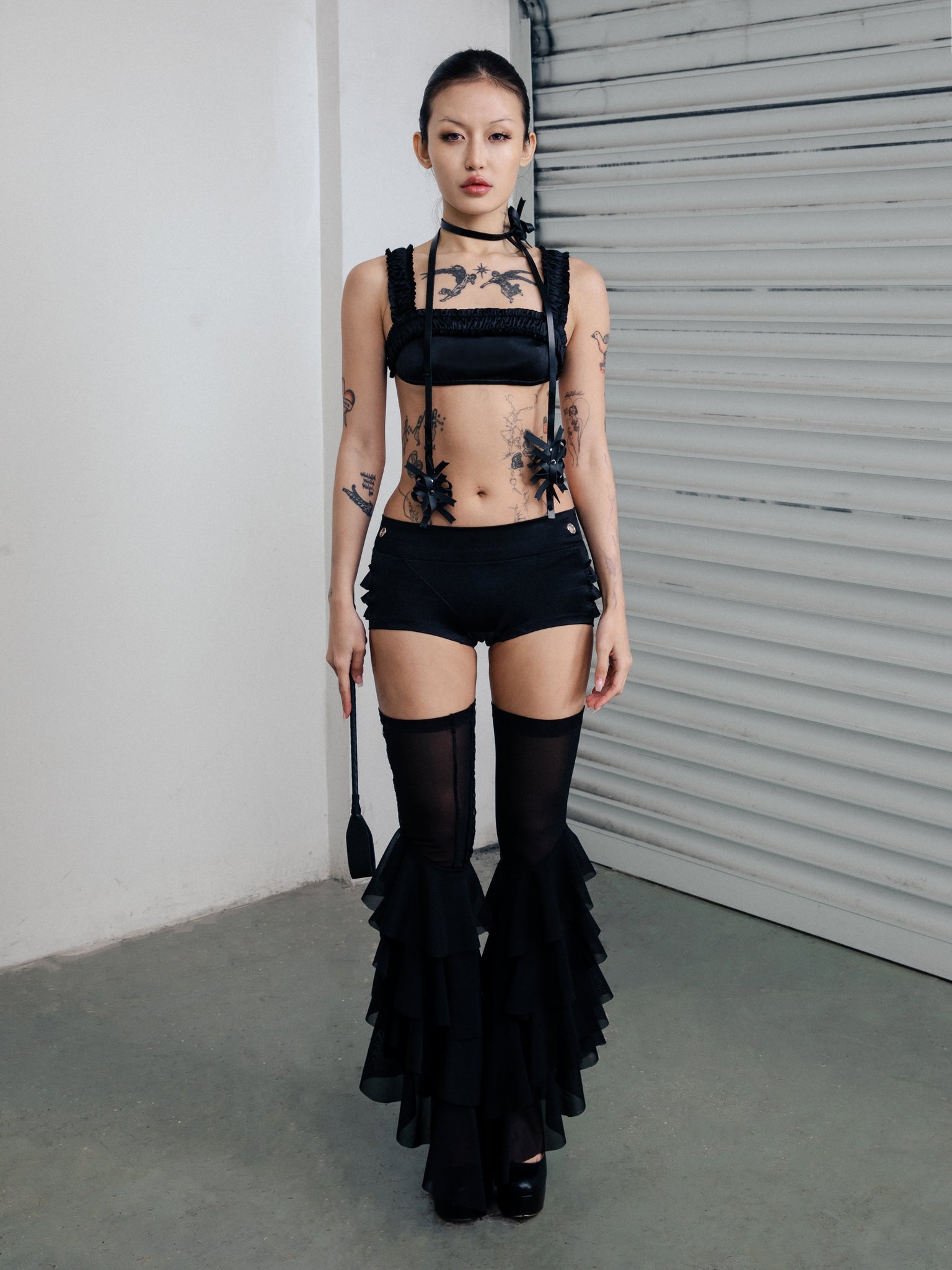 Mock Romance Ruffle in Black