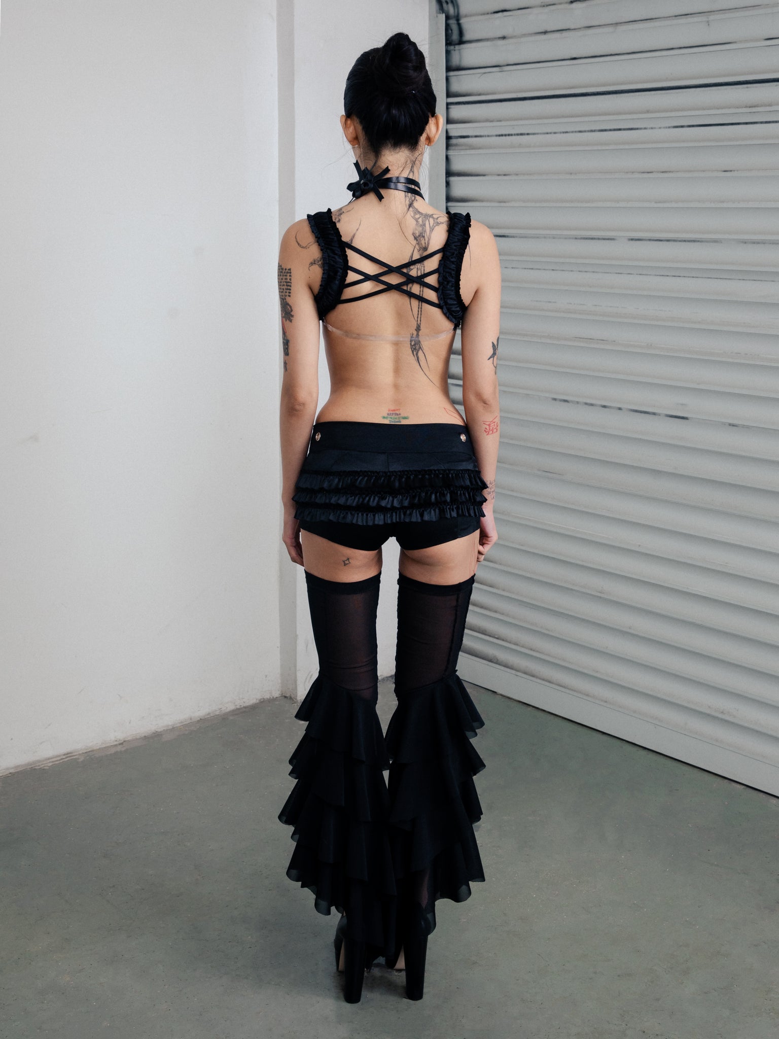 Mock Romance Ruffle in Black